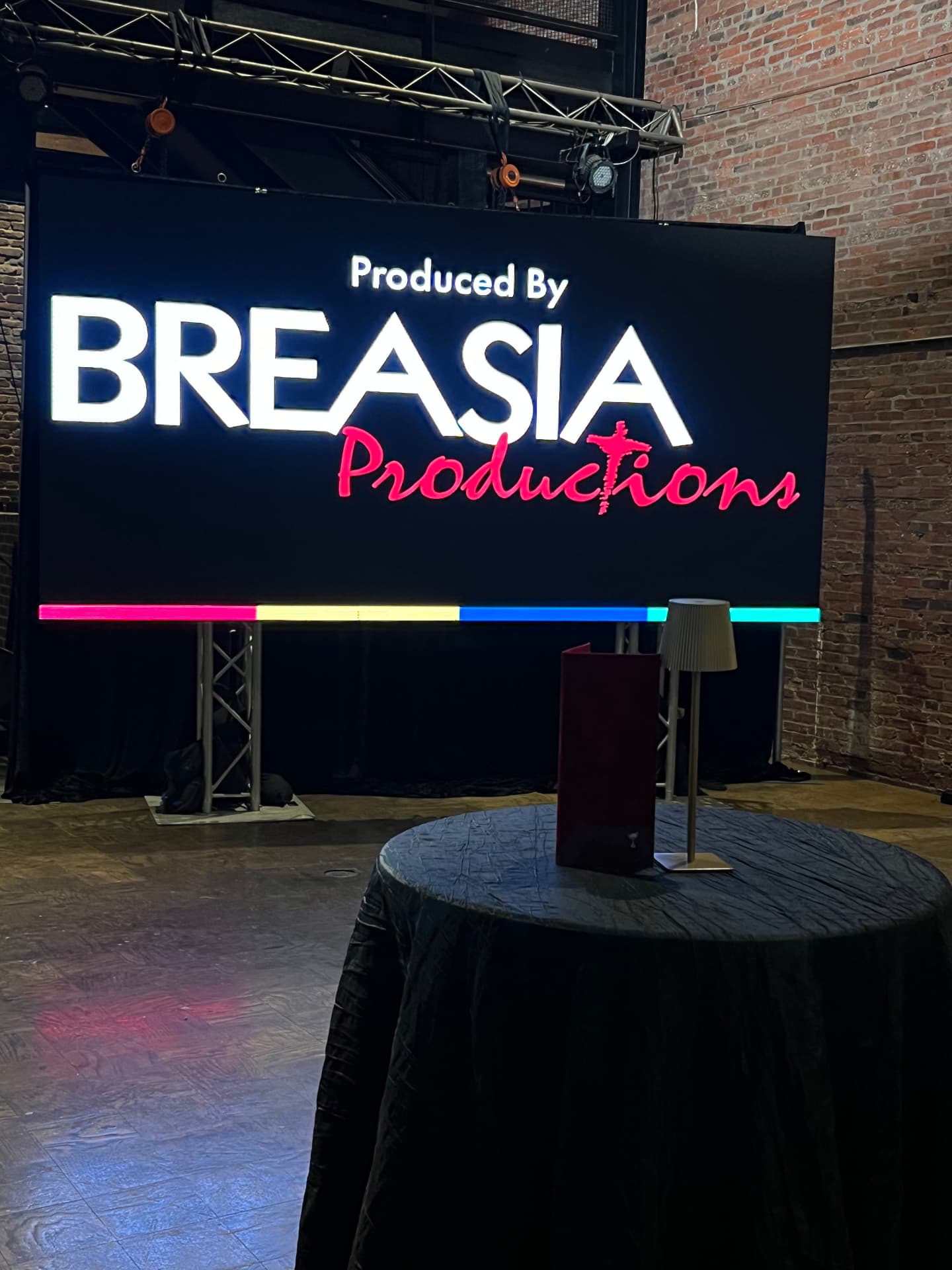 LED wall and truss with color changing lighting at a Breasia Productions event