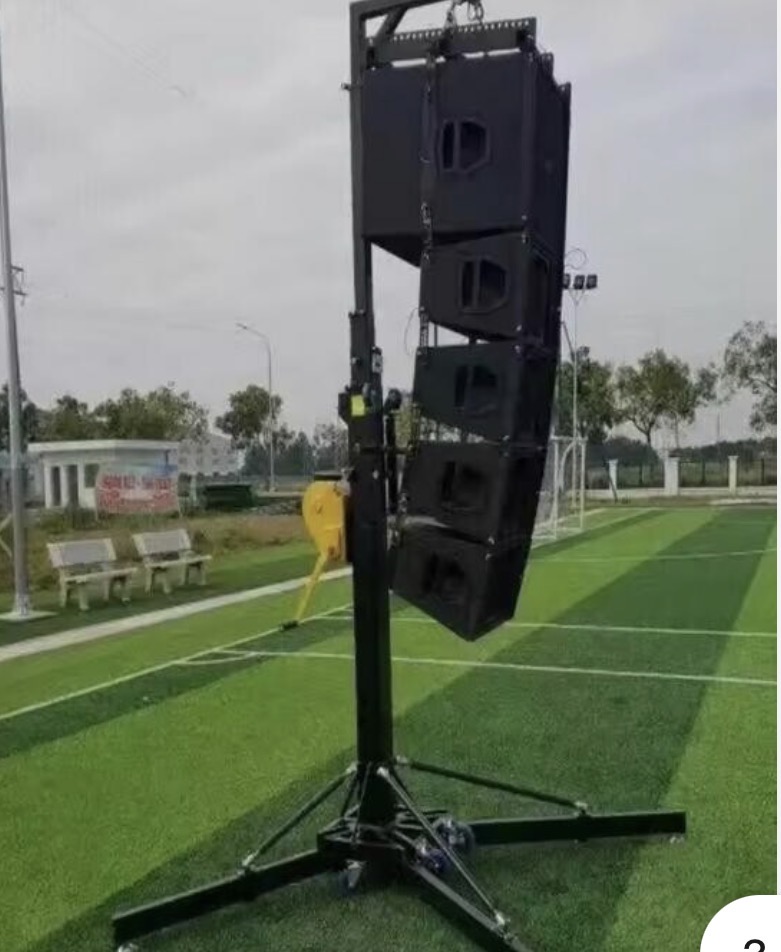 Line array speaker cluster flown on a ground support lift tower
