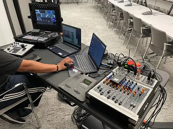 Virtual event production company hosting corporate webinar